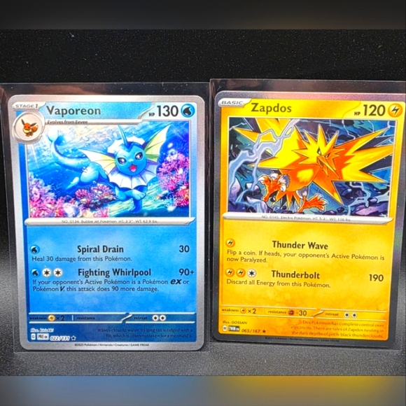 Pokemon Trading Cards - Blue Vaporeon Masterball and Yellow Zapdos - Picture 1 of 4